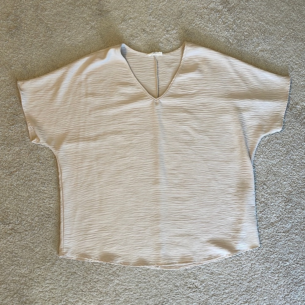 Cream oversized v neck blouse